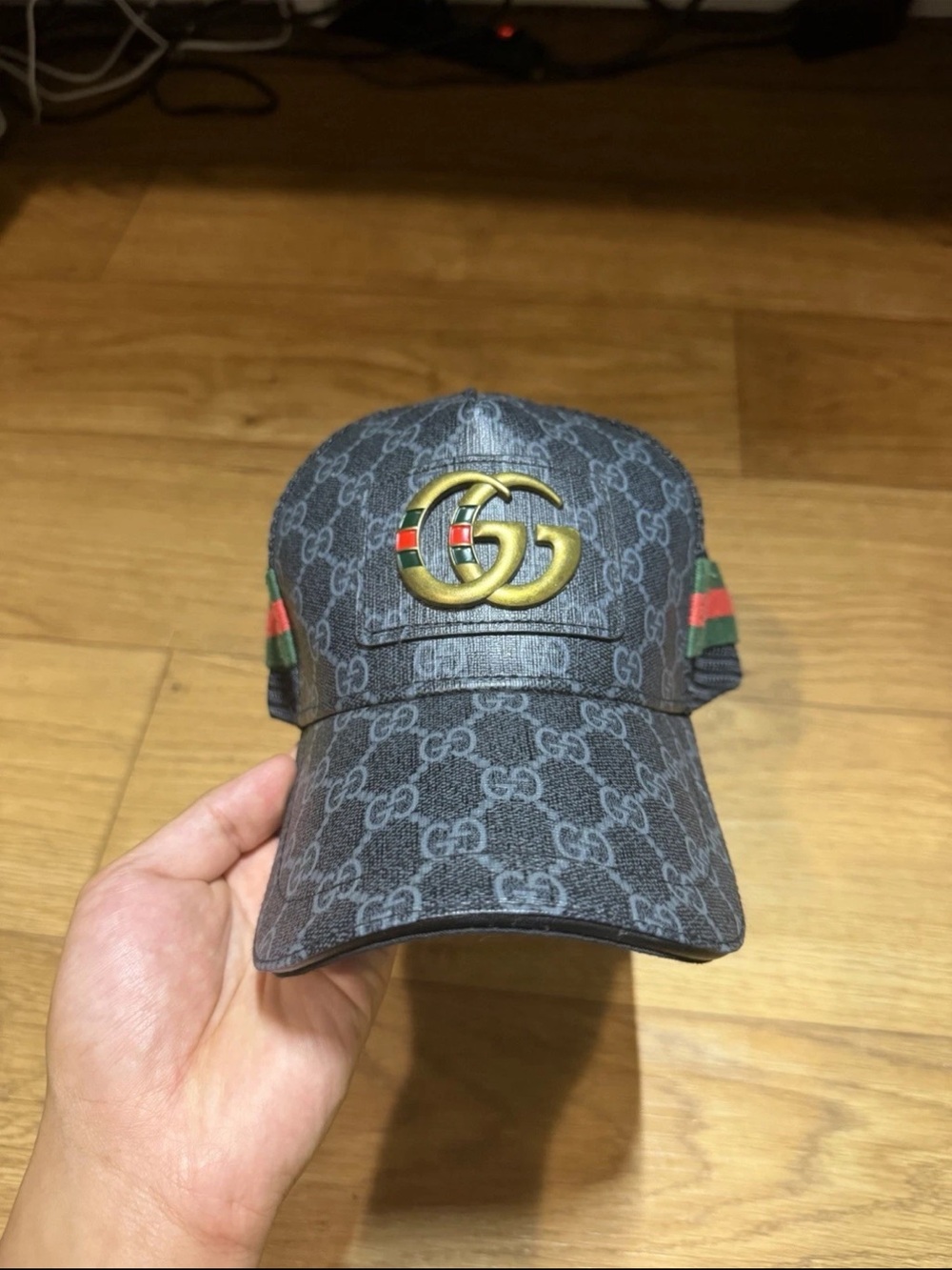 Gucci Black GG Monogram Cap with Gold Double G Emblem and Red-Green Stripes
